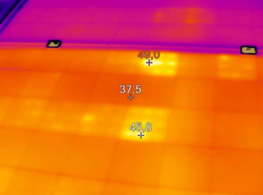 Thermal image of a solar module surface with readings between 37.5 and 49.0°C at three points