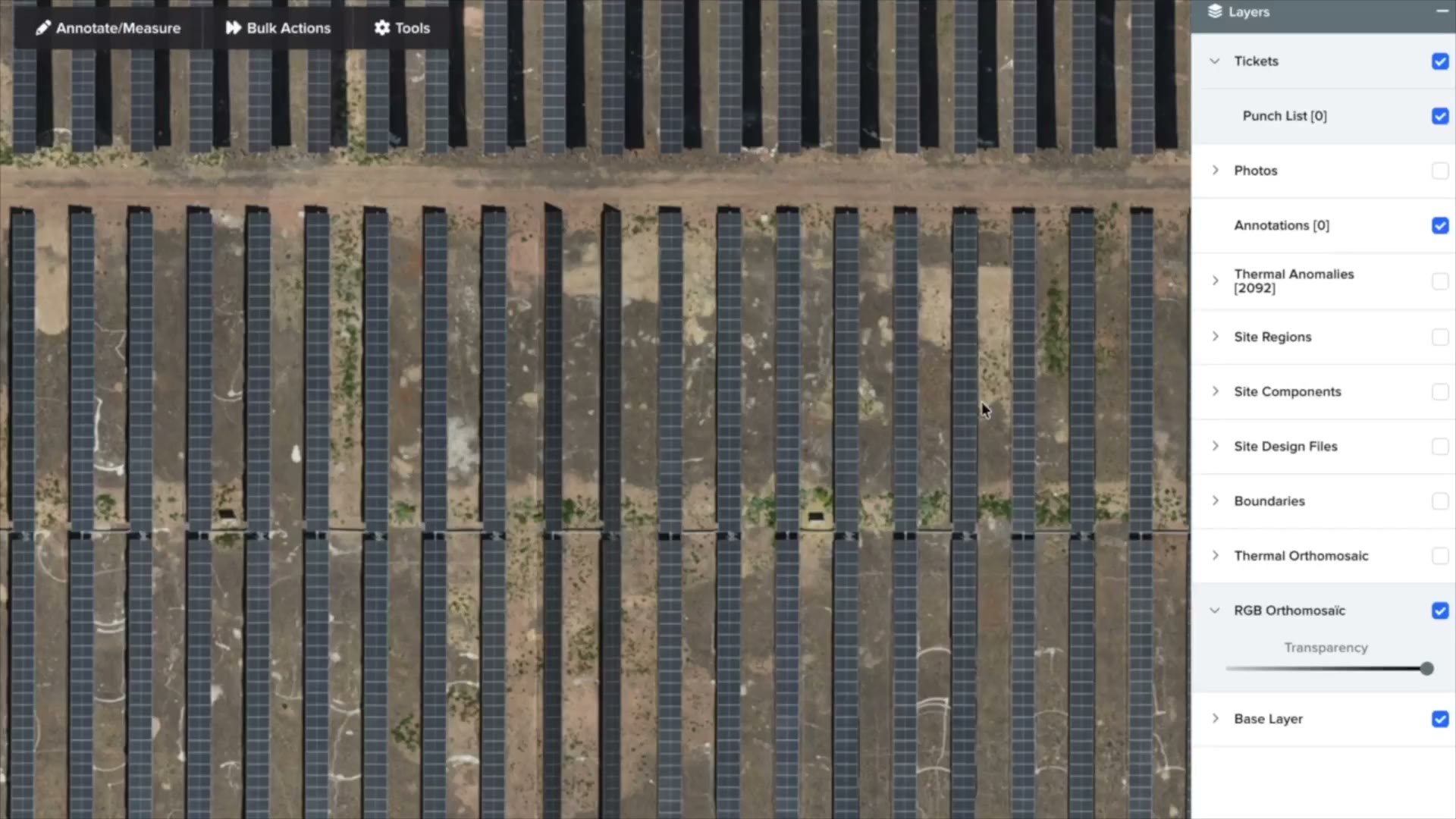 Aerial map of a solar plant in the field management app, with layers for tickets, photos and punch list